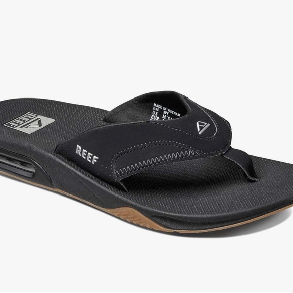 Mens REEF Fanning Black Silver Gum Bottle Opener Air Cushion Flip Flops - Picture 2 of 4